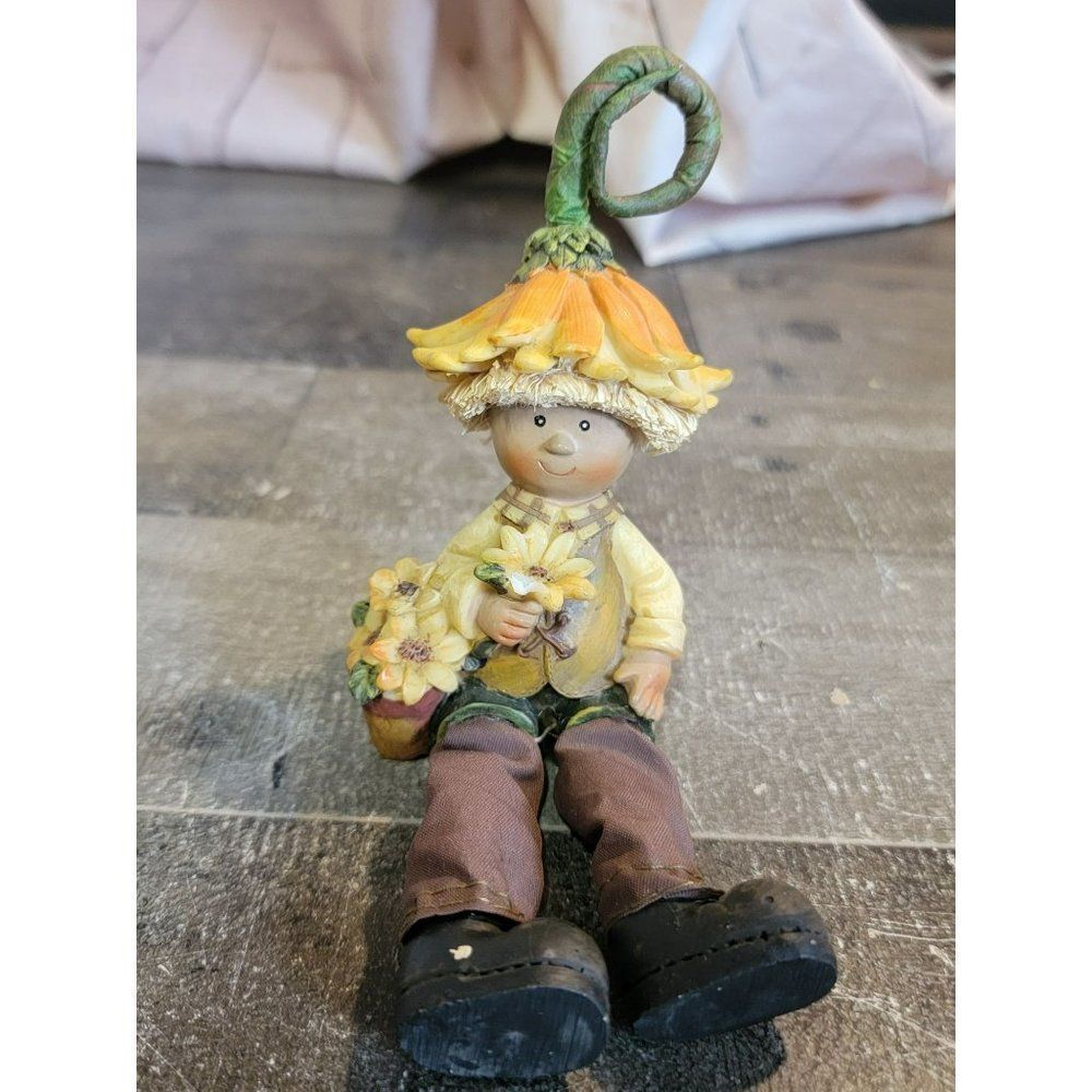Feet dangling sunflower boy Harvest fall decor